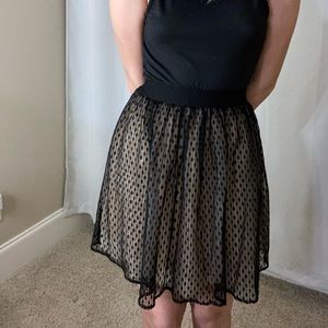 black and cream skirt